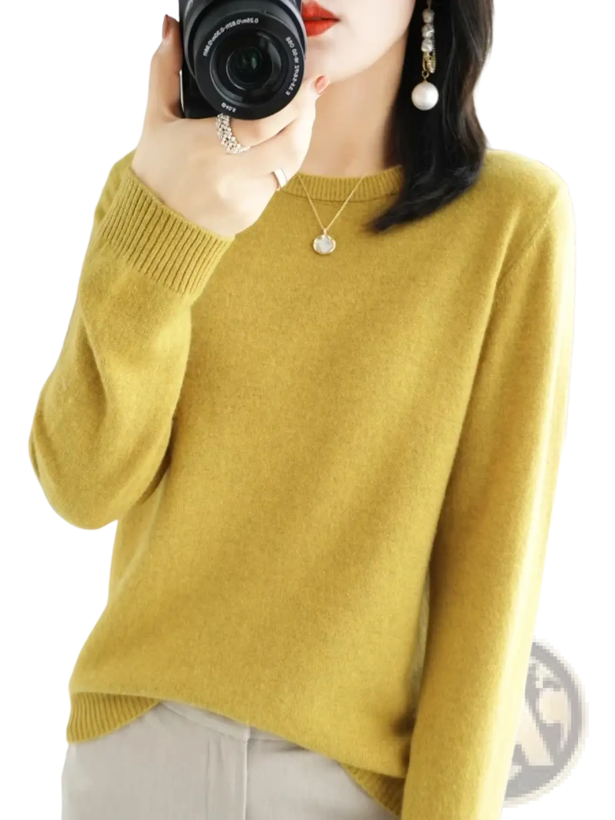 A soft mustard yellow merino wool casual pullover sweater with ribbed neckline and cuffs for women