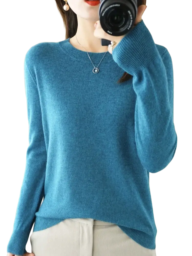 Merino wool women casual pullover sweater in soft teal knit with round neckline and ribbed cuffs