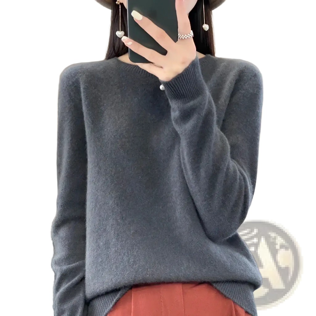 A soft dark gray merino wool women sweater with ribbed neckline and cuffs o neck pullover top