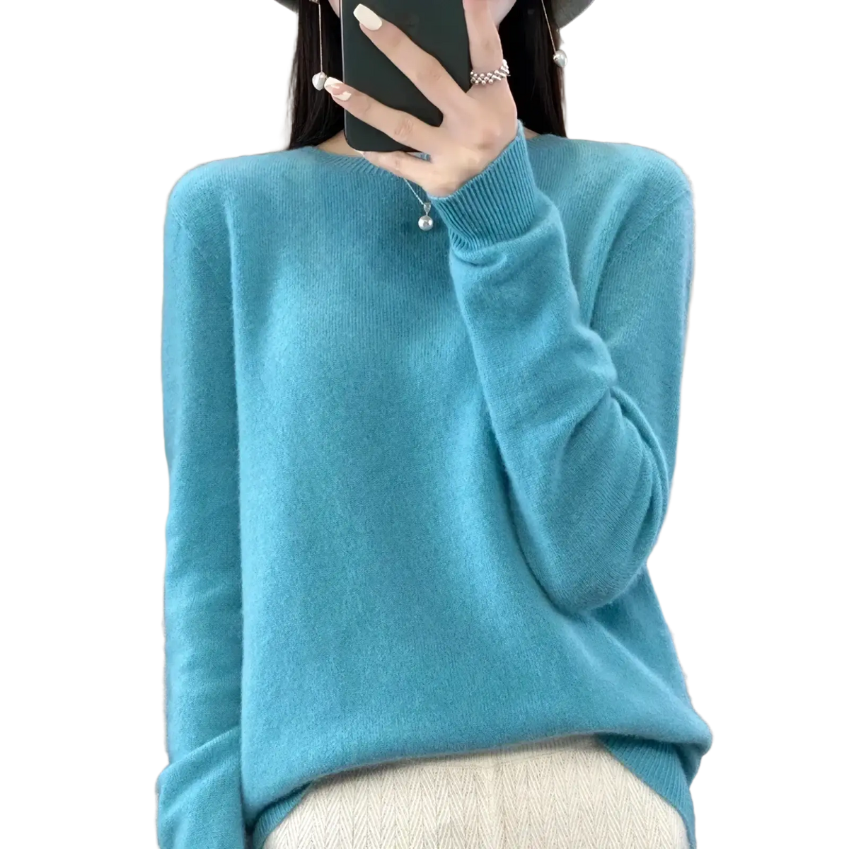 A soft light blue cashmere merino wool women sweater with ribbed turtleneck and long sleeves o neck pullover top