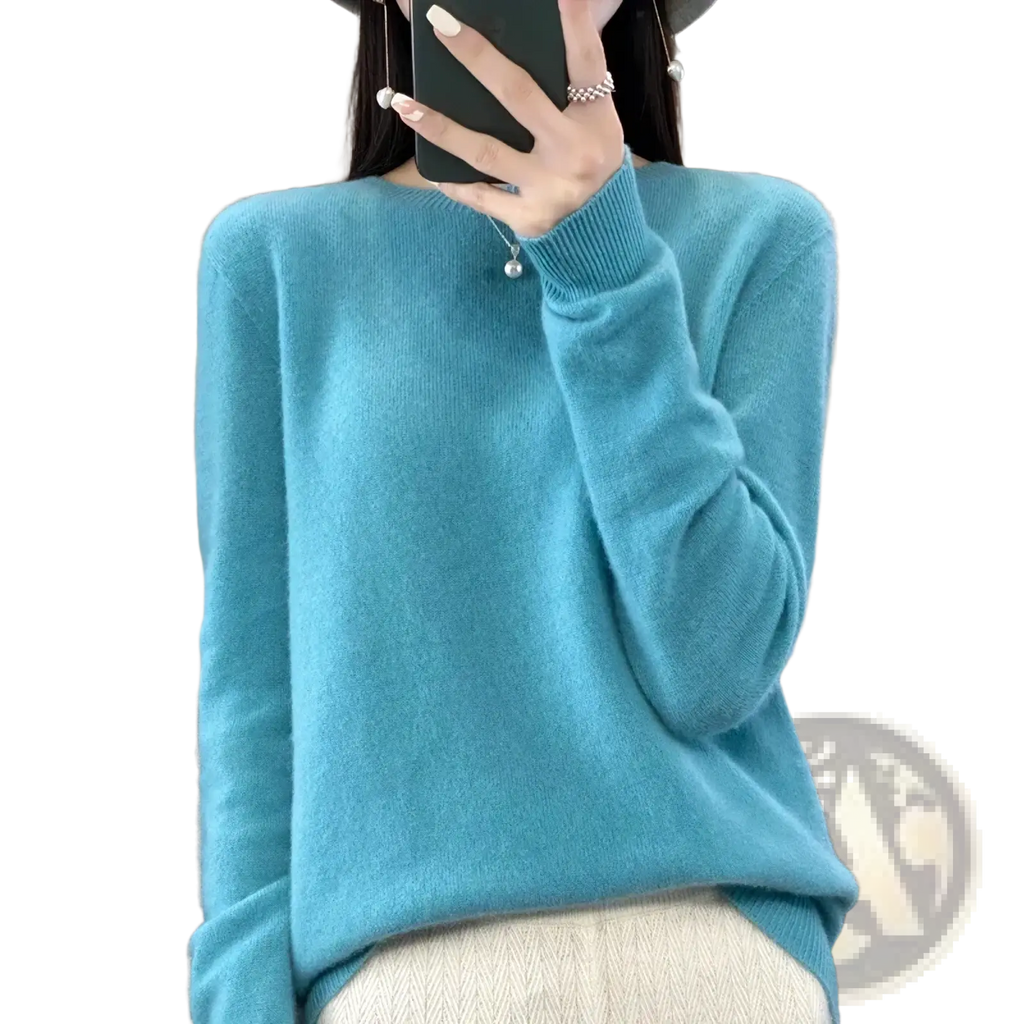 A soft light blue cashmere merino wool women sweater with ribbed turtleneck and long sleeves o neck pullover top