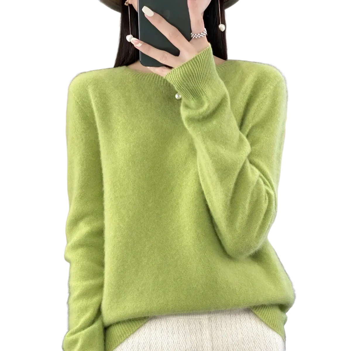 A soft light green merino wool women sweater with ribbed neckline and cuffs o neck pullover top
