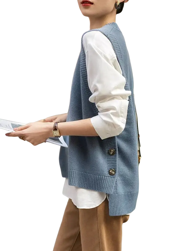 Merino wool women sweater vest in light blue knitted design with gold-toned buttons and ribbed hem