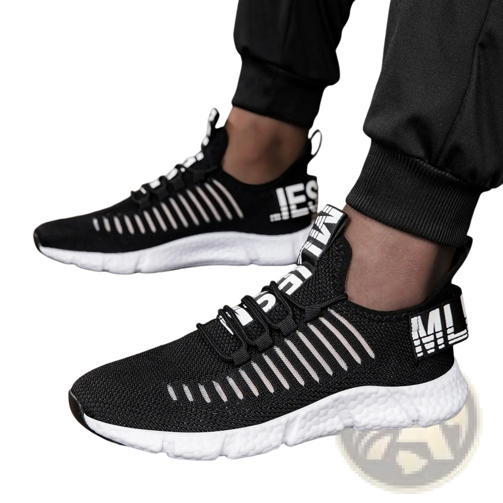 Black knit mesh athletic sneakers with white stripes and bold lettering, featuring a textured white rubber sole for running