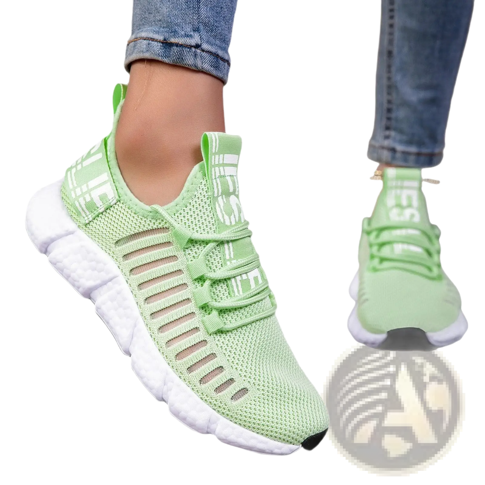Light green breathable mesh athletic sneakers with white laces and sole for casual running use