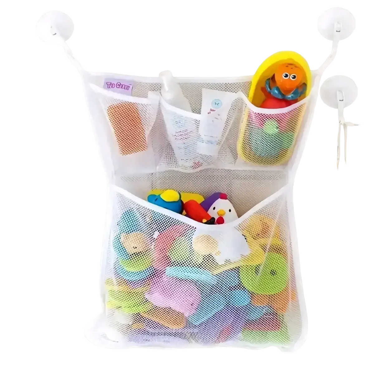 White mesh bath toy storage bag with suction cups mounted on wall holding colorful rubber toys and small bottle