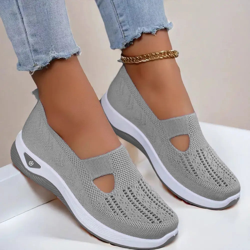 Women’s breathable mesh slip on casual flats in gray knit with a t-strap design and white and gray sole