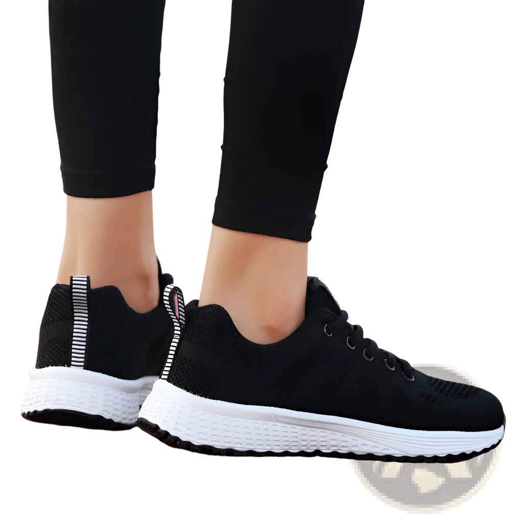 Black mesh fly woven sneakers with white rubber soles and striped pull tabs breathable athletic shoes back view