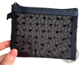Black mesh makeup bag with heart polka dot pattern and zipper closure for cosmetic storage