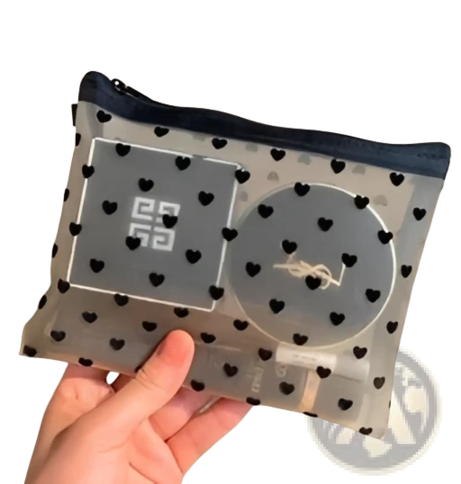 Clear mesh makeup bag with black heart polka dot pattern and navy blue trim featuring a zipper closure