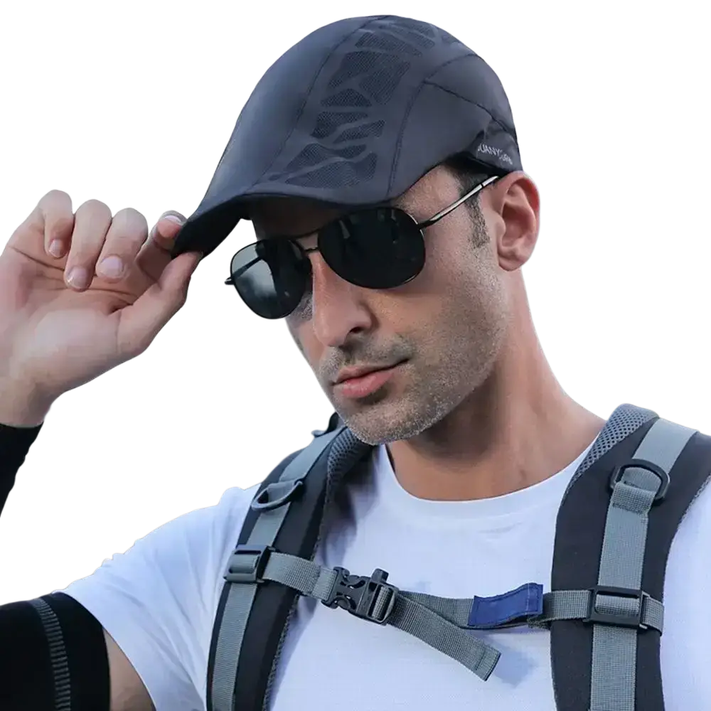 Dark gray breathable mesh newsboy golf cap with subtle geometric pattern and adjustable strap for summer driving
