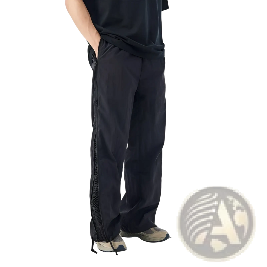 Black utility hiking pants with mesh side panel and drawstring hem for enhanced ventilation and adjustable fit