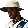 Beige and black mesh uv protection bucket hat with adjustable chin strap shown from the back side