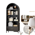 Dark gray metal arched bookshelf with glass doors and drawer holding books binders decorative items and a globe