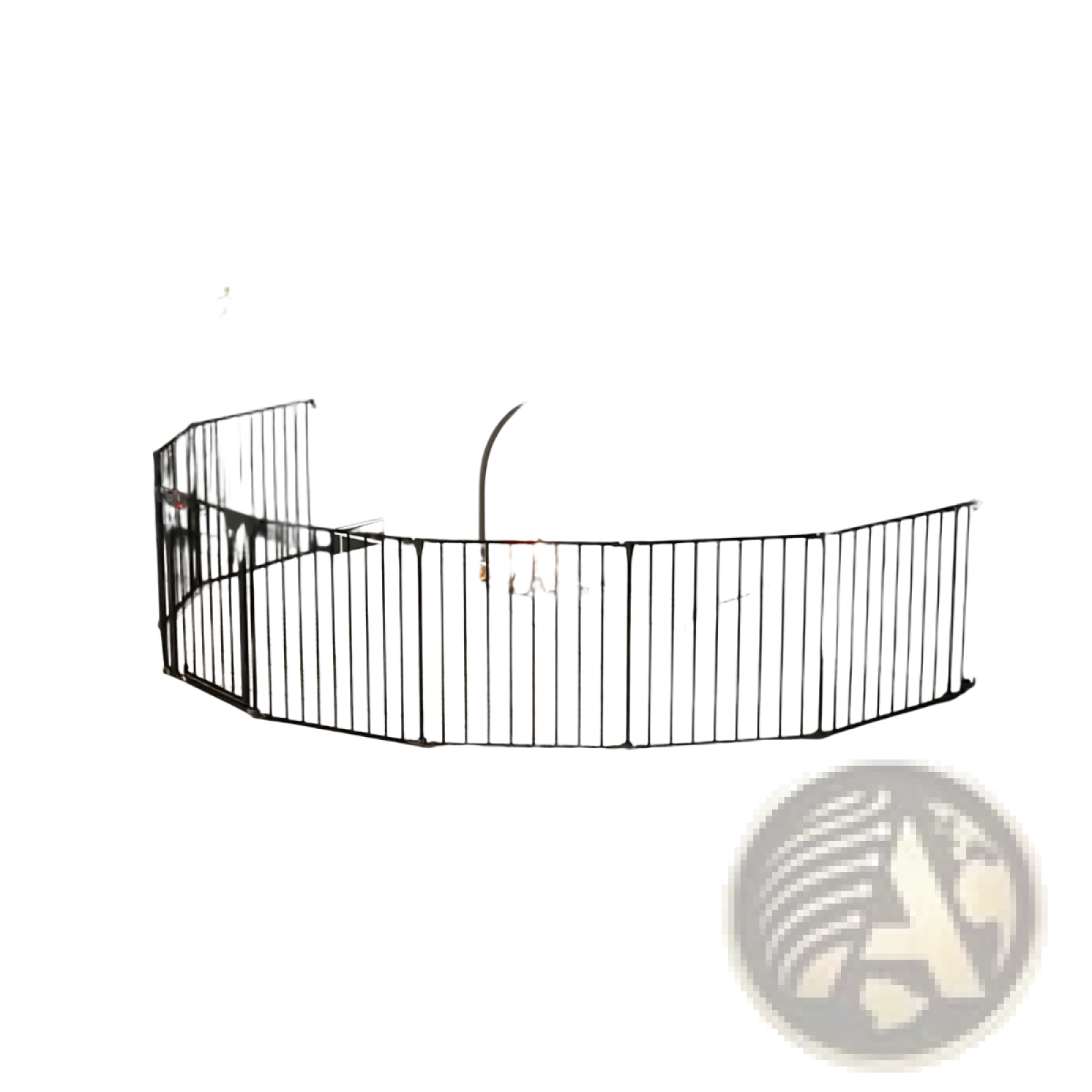 Black metal baby safety gate with vertical bars and curved ends designed as a fireplace safety barrier