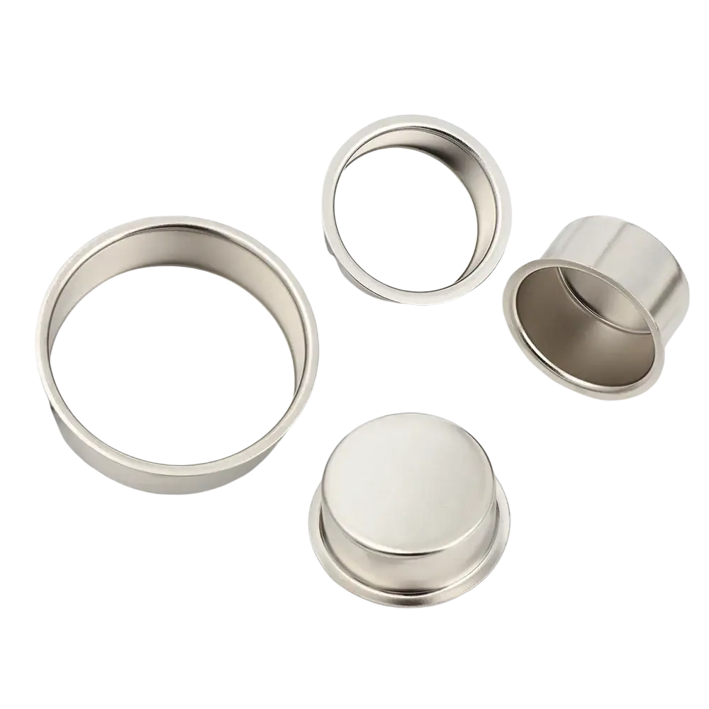 Set of four sleek polished stainless steel cylindrical metal candle cups for diy crafts and holders
