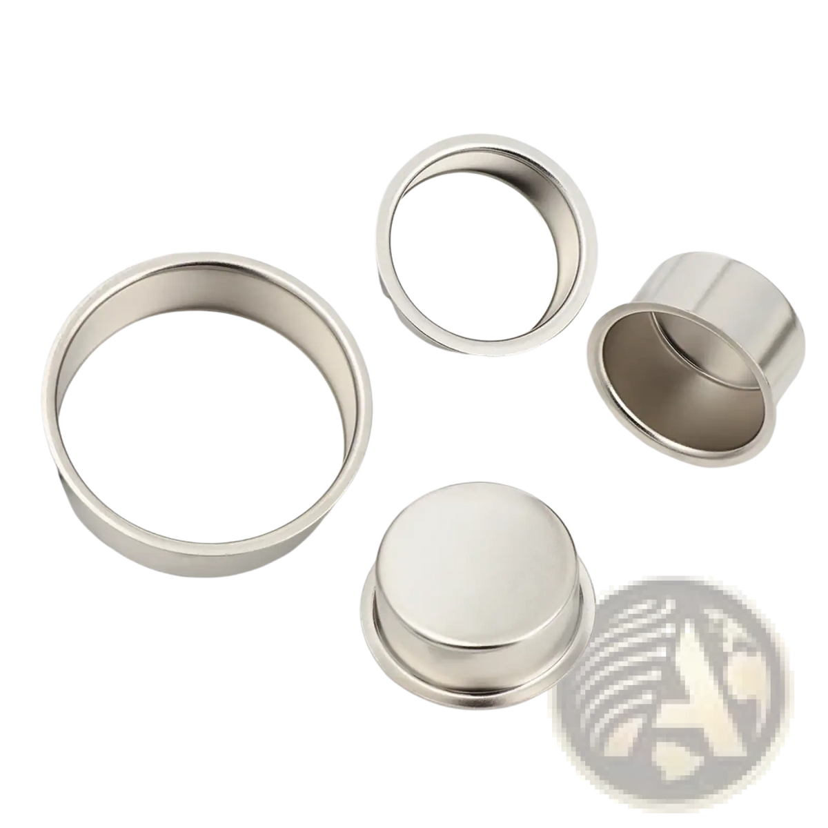 Set of four sleek polished stainless steel cylindrical metal candle cups for diy crafts and holders