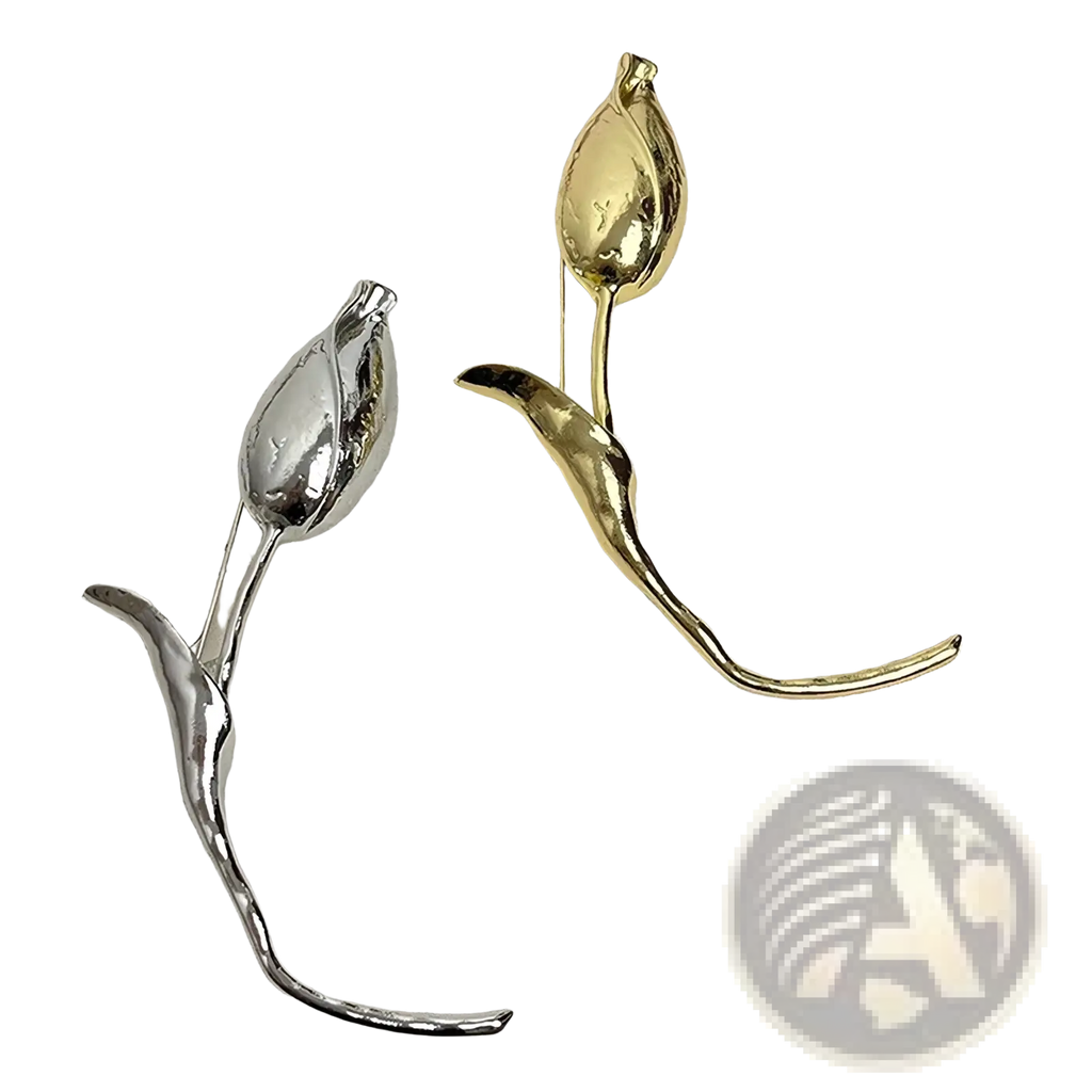 Two metallic flower brooch pins in polished silver and gold tone for elegant suit corsage decoration