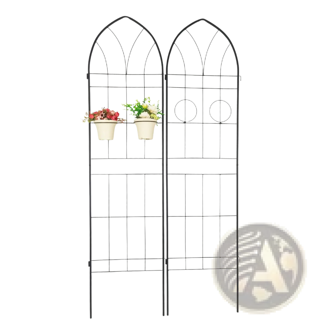 Black wrought iron metal garden trellis with arched top and circular cutouts featuring two hanging white planters