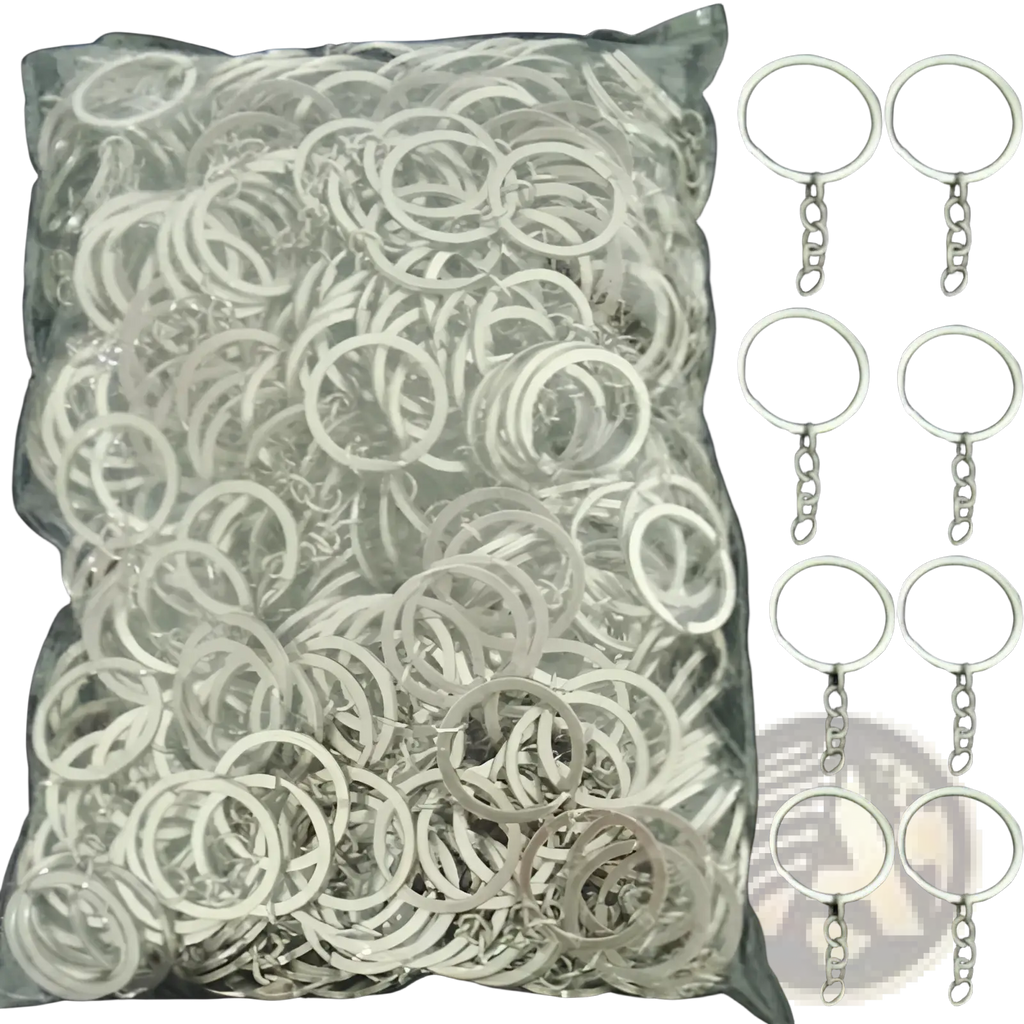 A clear plastic bag containing numerous silver metal keychains with split rings and small attached chains