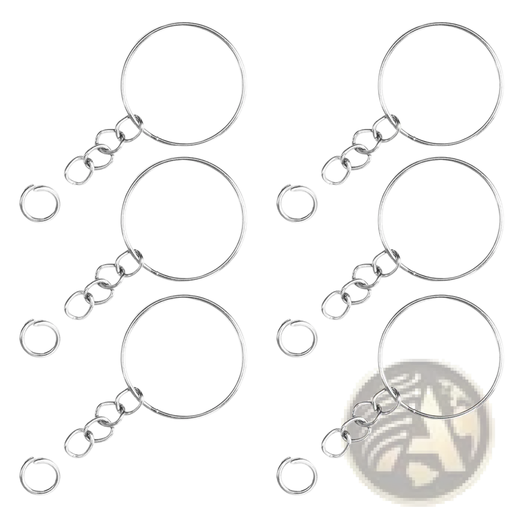 Set of six silver-toned metal keychains with split rings, short chain links, and separate jump rings for keys
