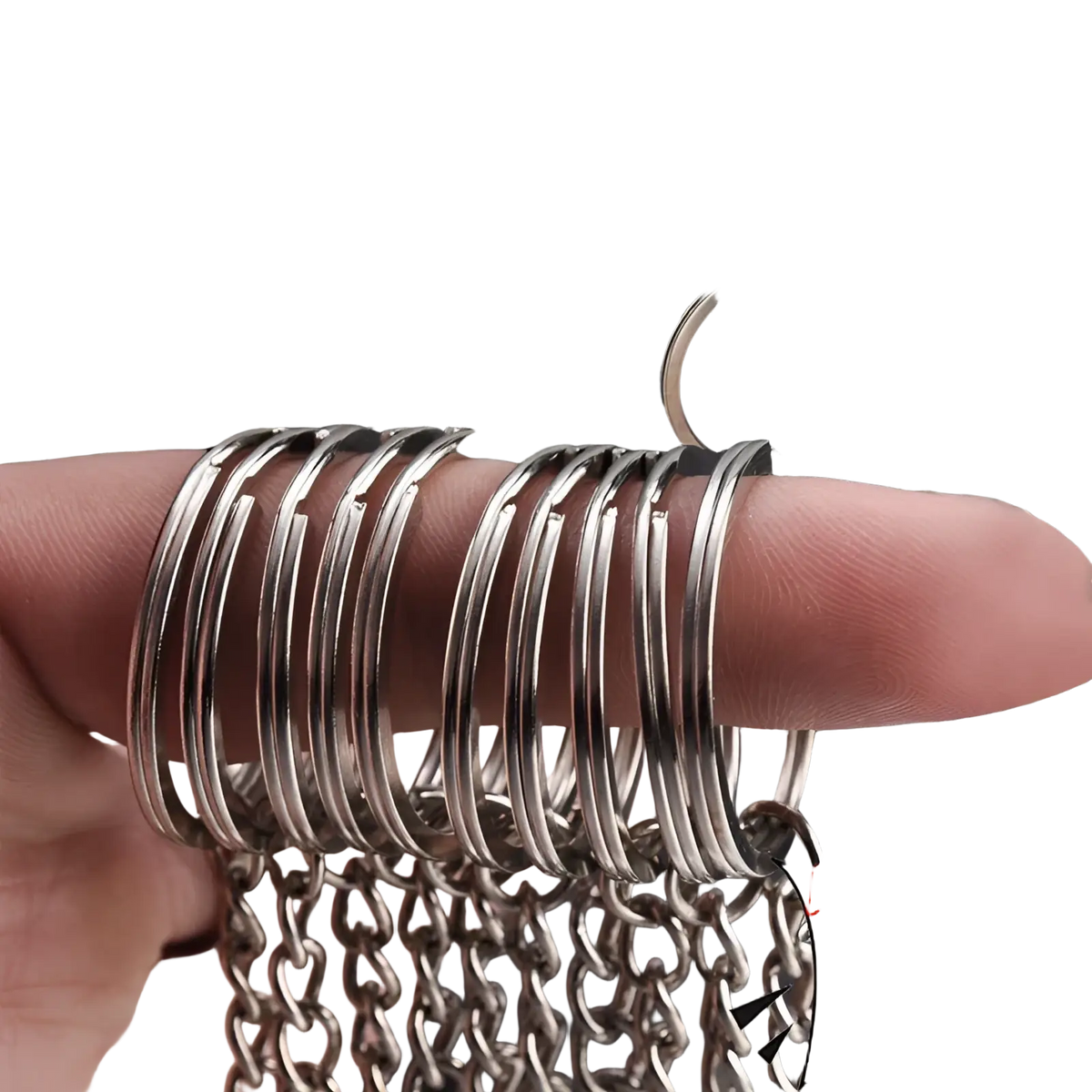 A stack of silver-toned metal keychains with split rings and chains featuring a smooth polished finish