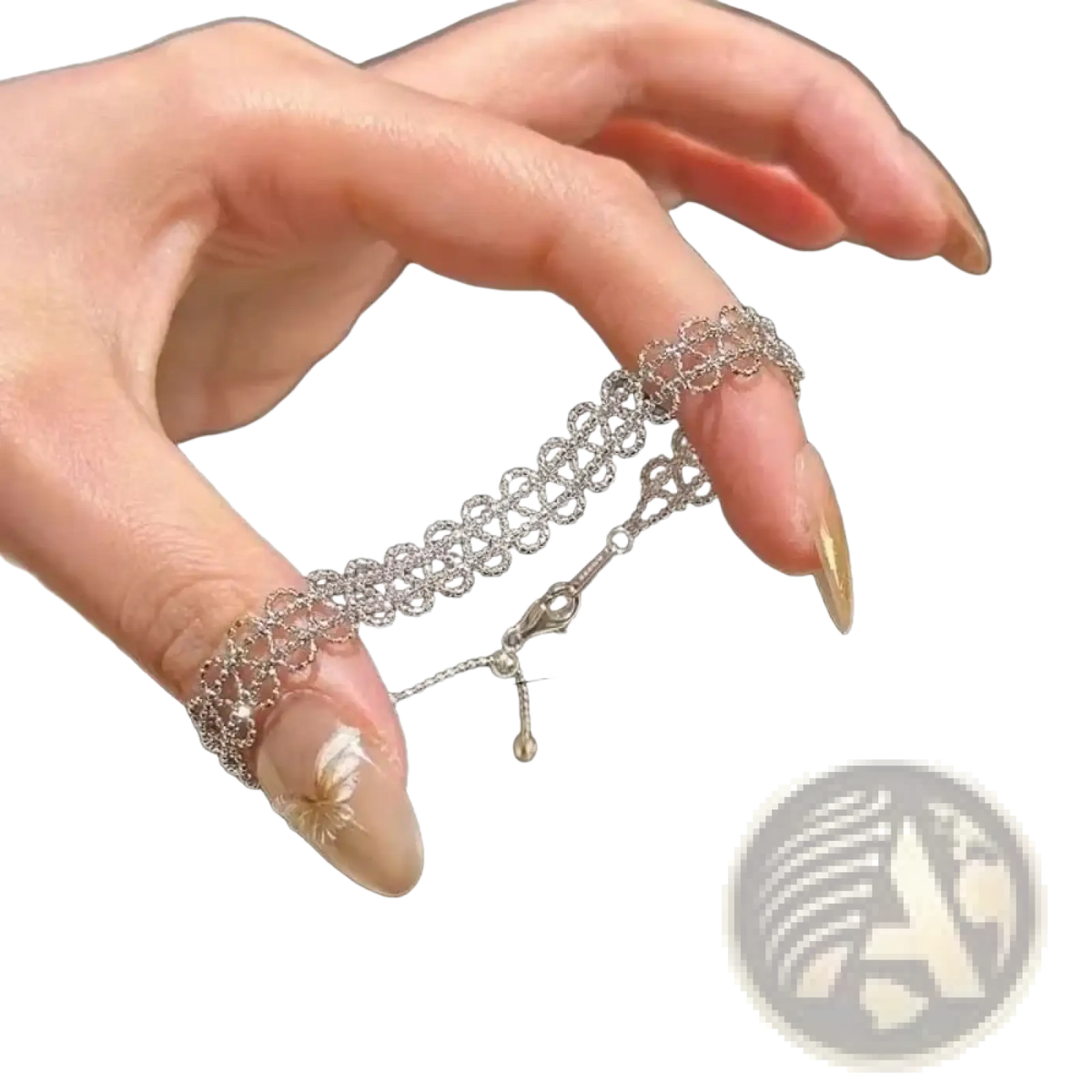 Silver chain finger ring with intricate lace-like design and small dangling charm from metal lace bracelet adjustable fashion jewelry collection