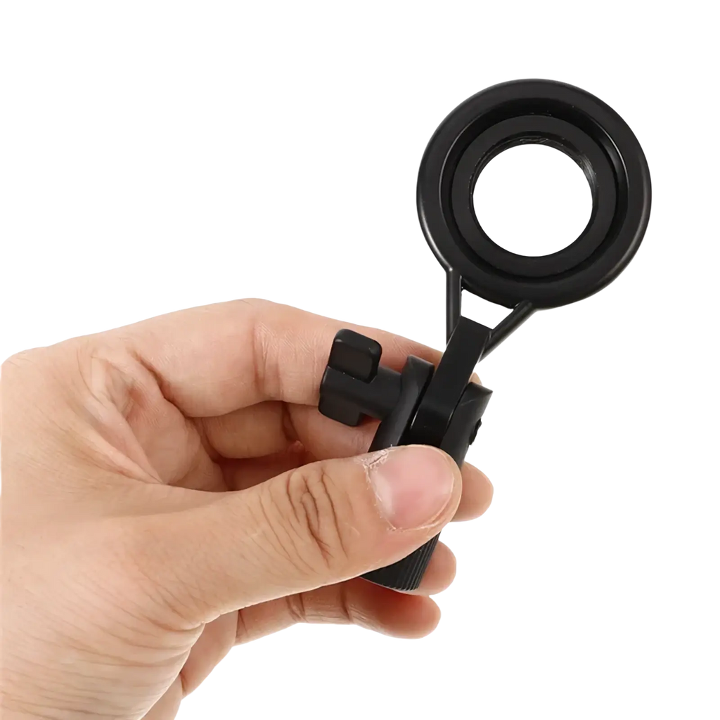 Black metal microphone stand clip with adjustable mount and ergonomic handle featuring a circular lens magnifier