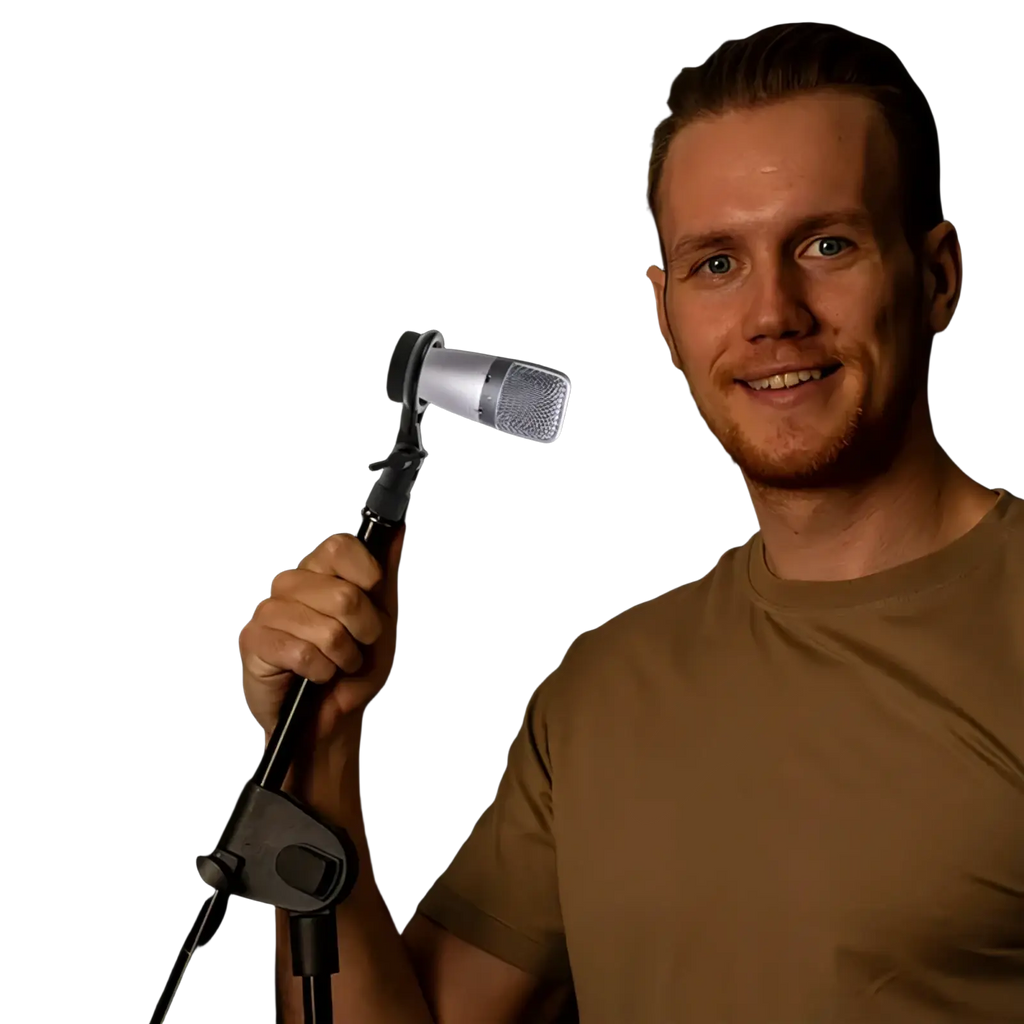 Silver metal condenser microphone with mesh grille mounted on a black adjustable metal microphone stand clip