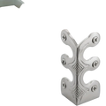 Silver metal skirting board corner protector with ornate leaf patterns and diamond-stitched detailing