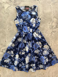 A navy blue sleeveless metallic floral print cotton dress with fitted bodice and flared skirt in large size