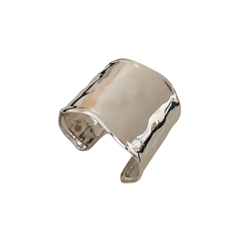 Metallic pleated cuff bracelet for women in hammered silver with a wide open design and reflective surface