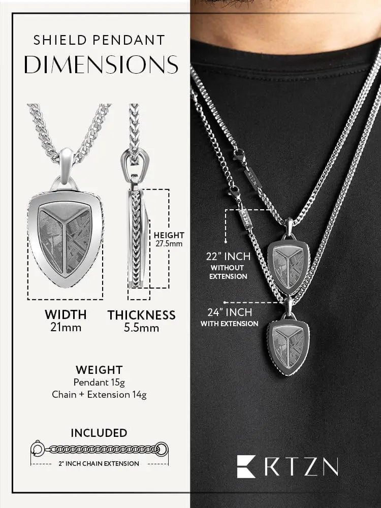 Silver shield-shaped Muonionalusta meteorite pendant with engraved geometric triangular design on wheat chain
