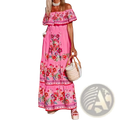 A vibrant pink Mexican floral off shoulder maxi dress with bold red and green floral embroidery and tiered ruffles