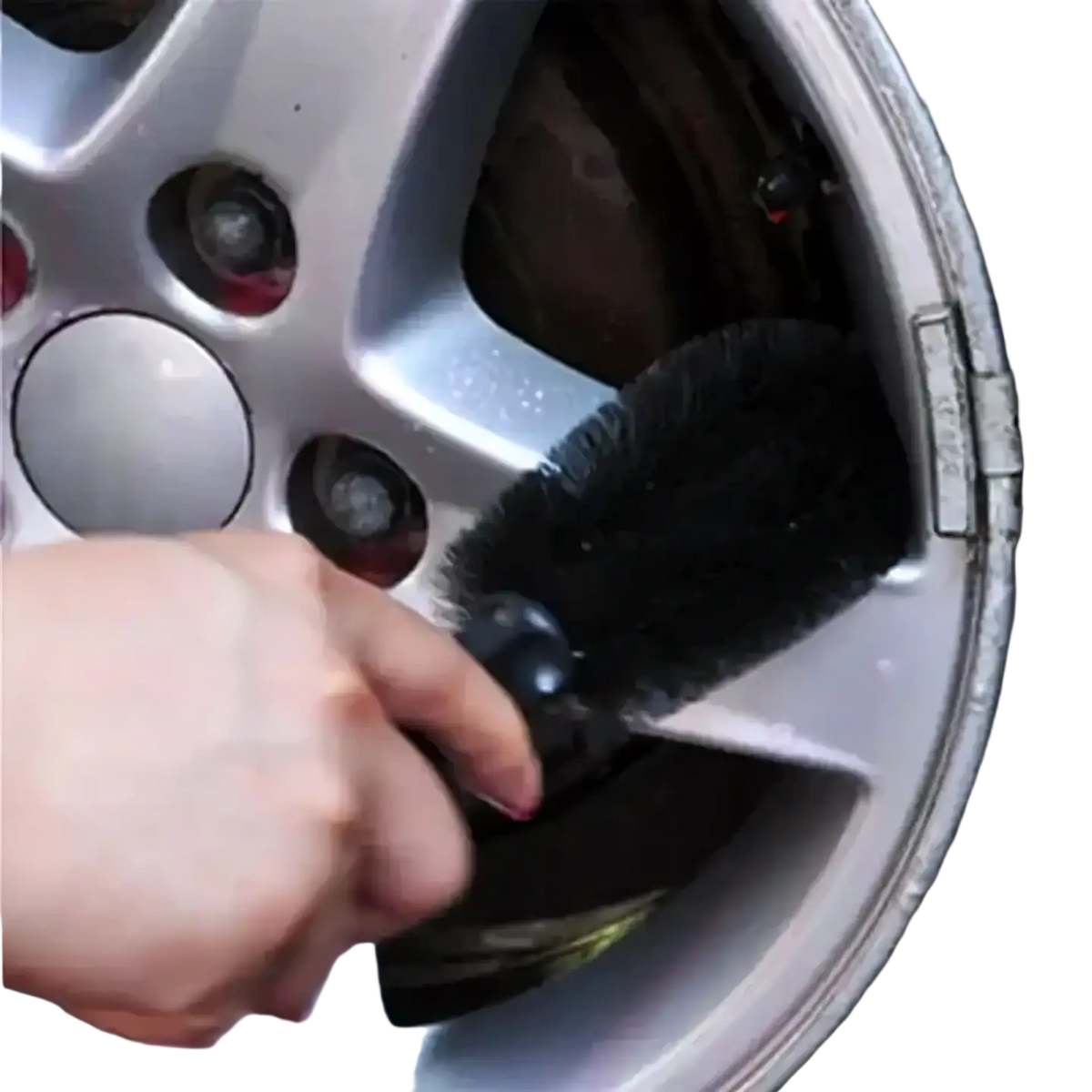 Black bristle wheel brush with black handle cleaning a silver alloy wheel microfiber car wheel cleaning brush