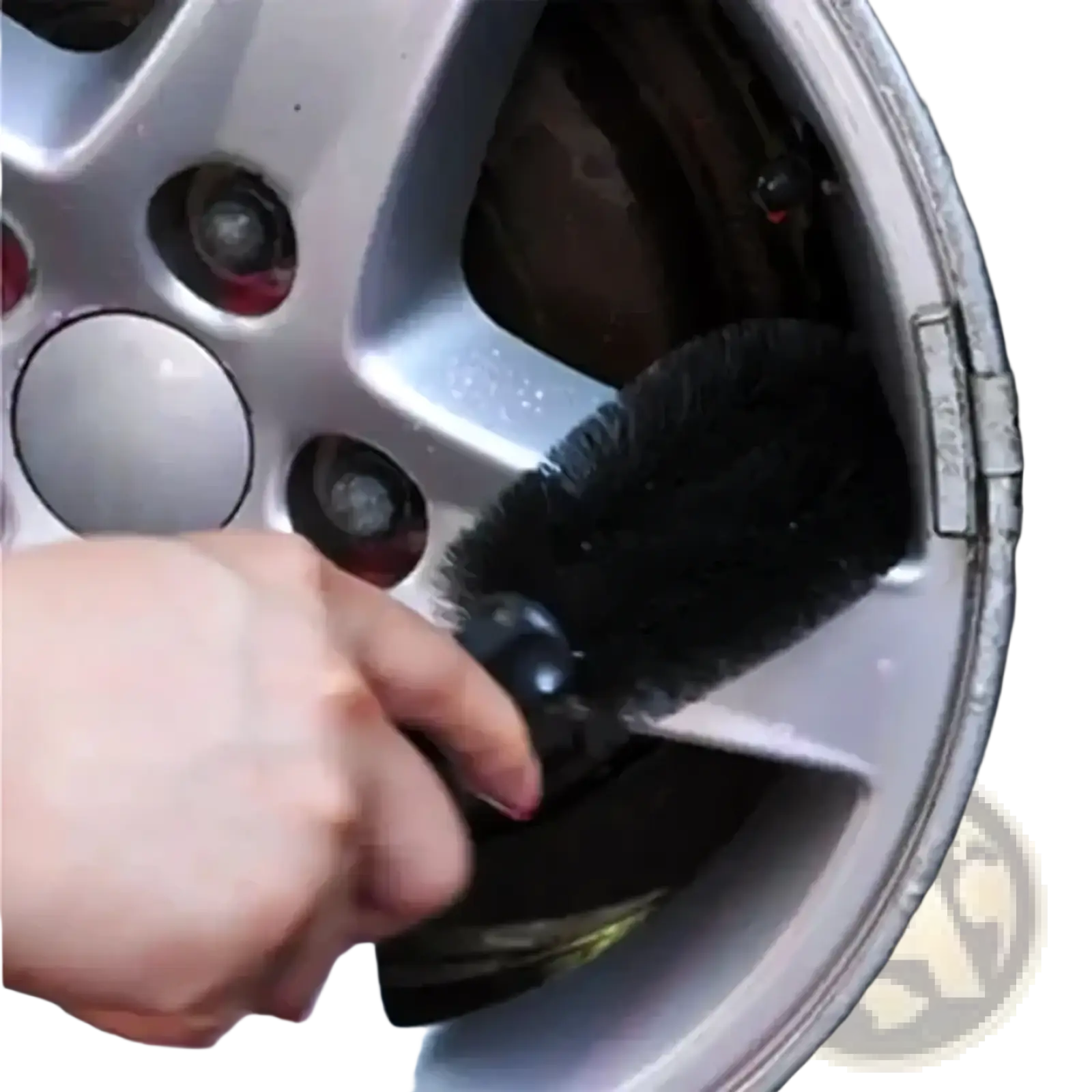 Black bristle wheel brush with black handle cleaning a silver alloy wheel microfiber car wheel cleaning brush