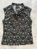 Black sleeveless blouse with a detailed pattern of white and light green butterflies skulls and foliage vintage style