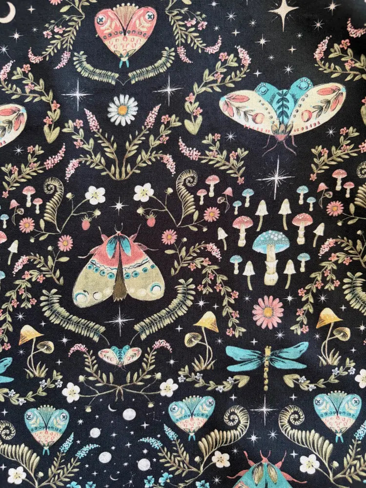 Dark cotton midnight butterfly print a-line midi dress with whimsical pastel butterflies mushrooms flowers and stars pattern