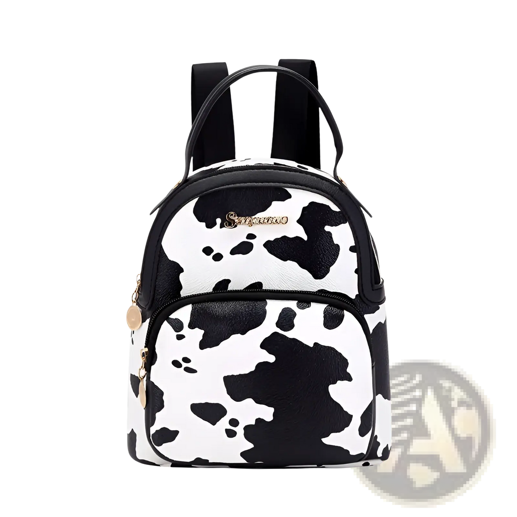 Mini backpack with black and white cow print faux leather material and gold-tone hardware in korean style