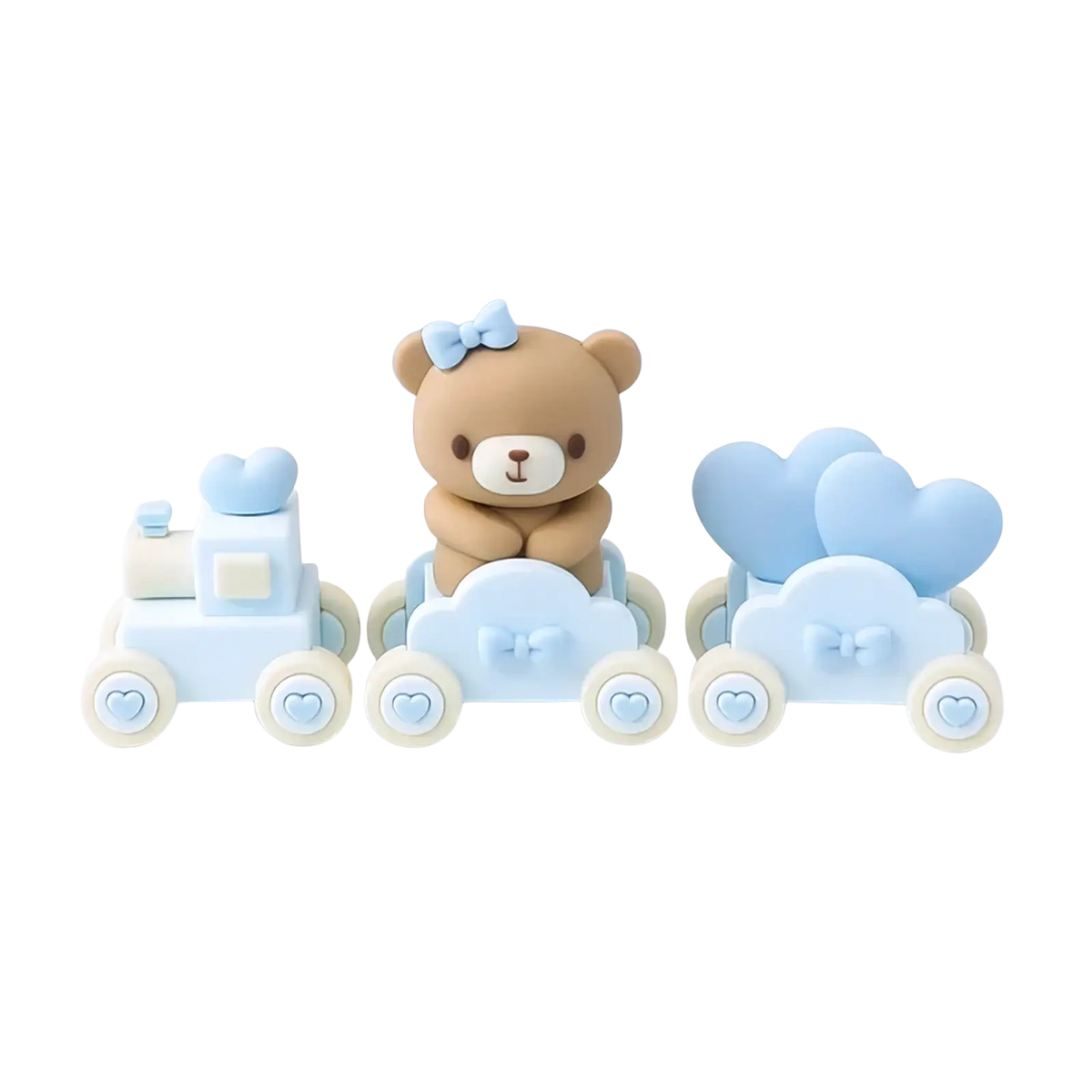 A charming beige teddy bear with a light blue bow sits on a pastel blue and cream resin three-carriage mini bear cake topper set