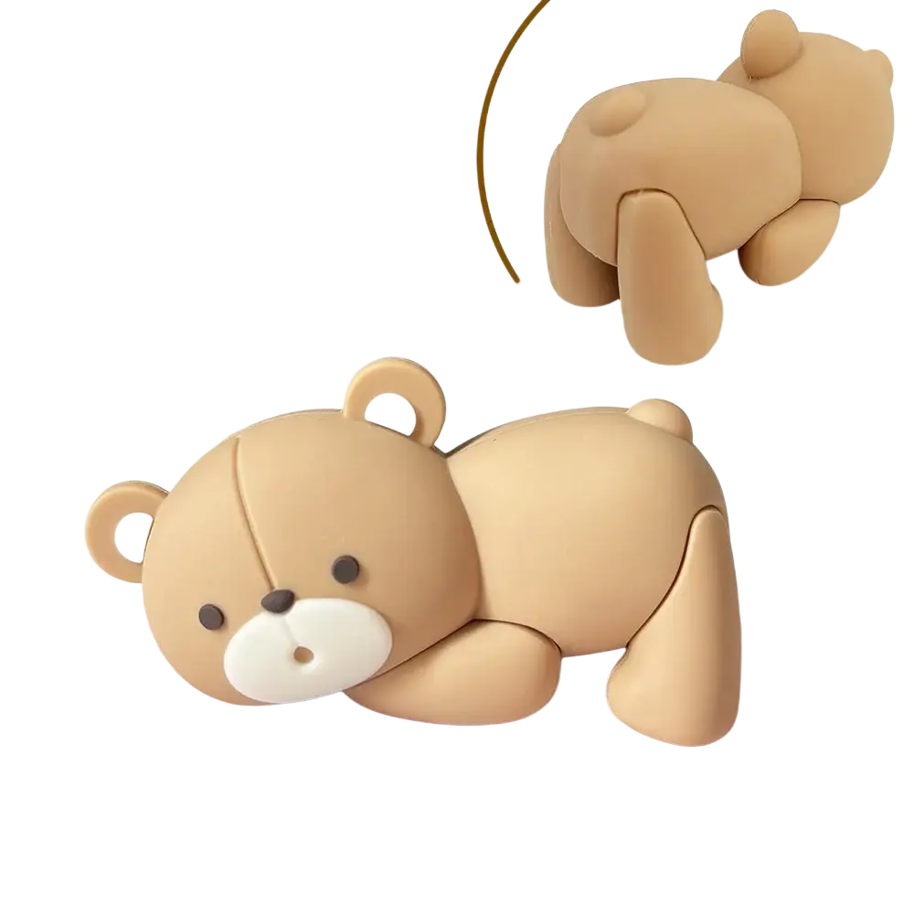 Mini bear cake topper set featuring a cute tan plastic bear figurine with white snout and ears lying down