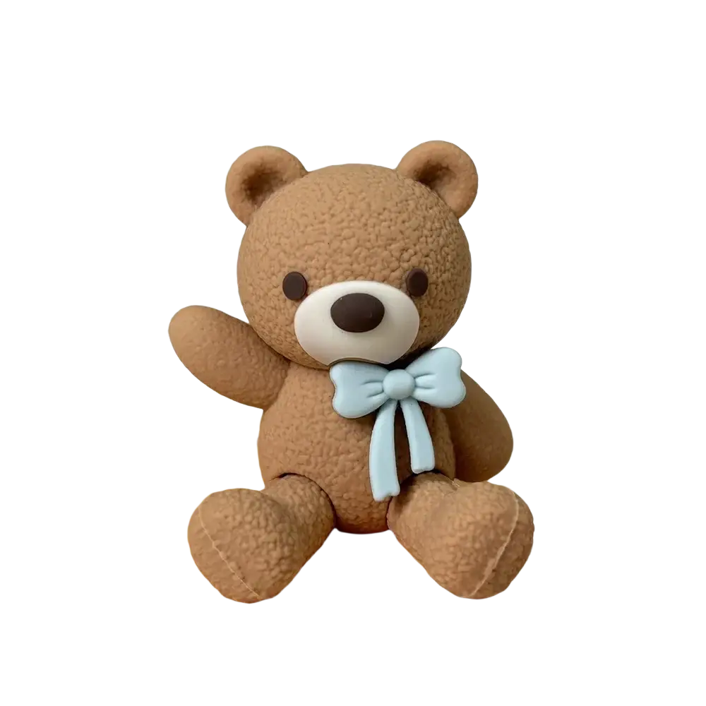 Dark brown mini bear cake topper figurine with light blue bow tie for decorative cake accents