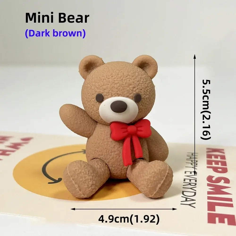 Dark brown mini bear figurine with red bow tie cake topper from mini bear cake topper set