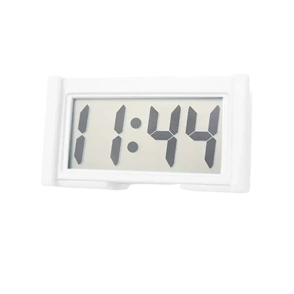 White rectangular mini car digital clock with black segmented LCD numerals displaying 1:44 for dashboard use