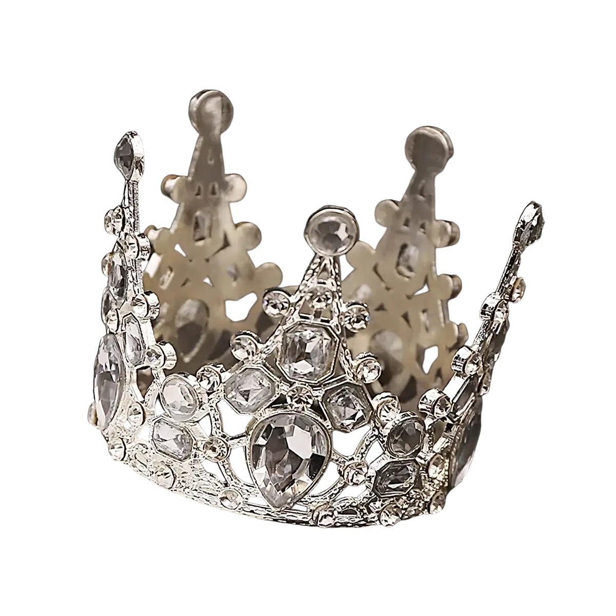 A sparkling silver mini crown cake topper and hair tiara adorned with clear faceted crystals and intricate filigree detailing