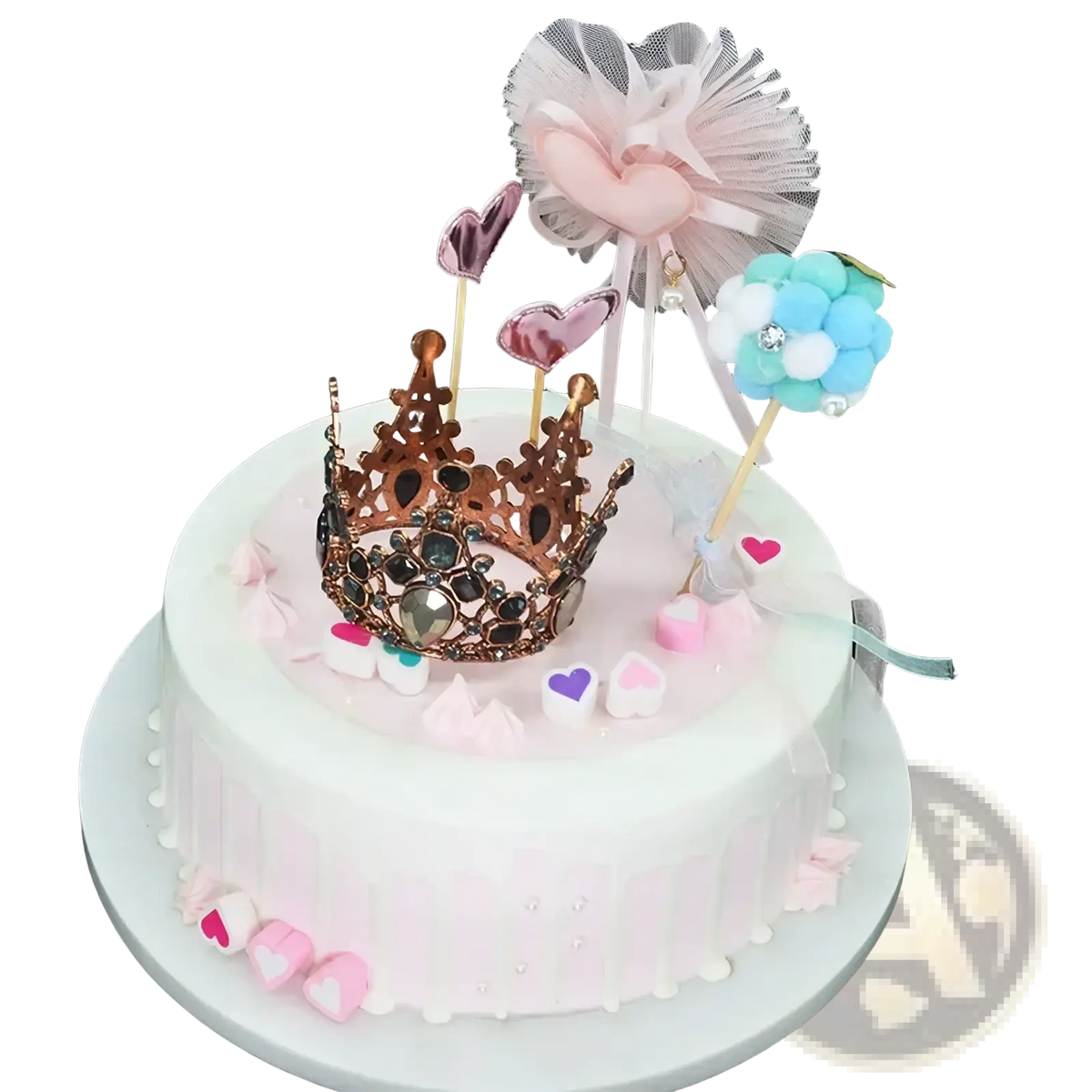 Mini crown cake topper and hair tiara with rose gold crown, pink and purple hearts, and blue white pom-pom on frosted cake
