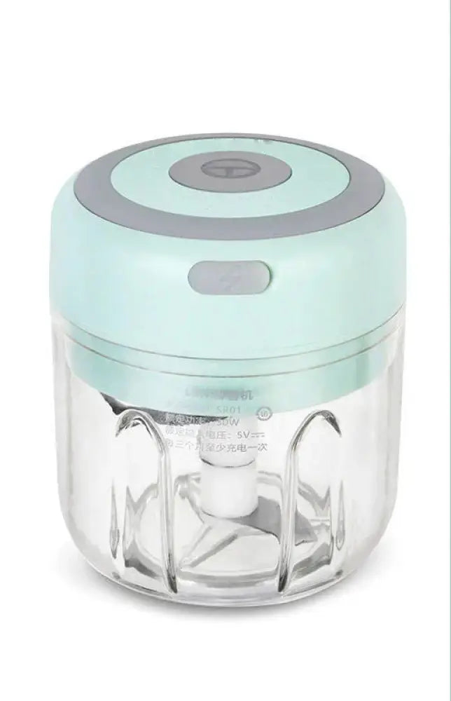 Usb electric mini food chopper and garlic mincer in mint green and gray with a clear glass container for easy use
