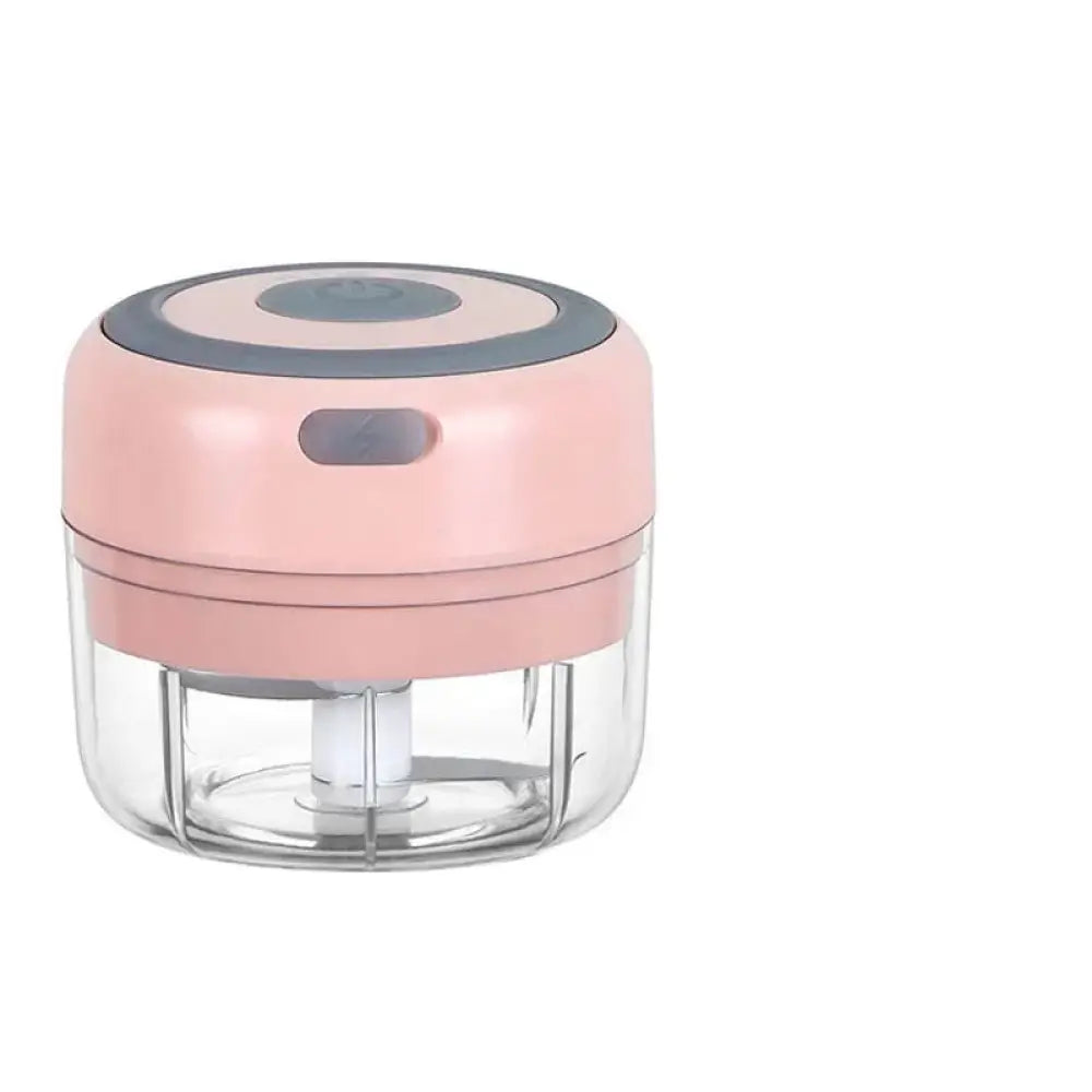 Usb electric mini food chopper and garlic mincer in pink and clear plastic with a gray circular top handheld design