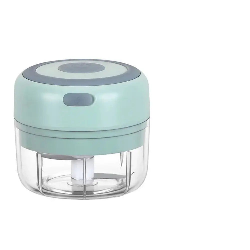 Usb electric mini food chopper and garlic mincer in compact mint green and clear plastic with gray circular top