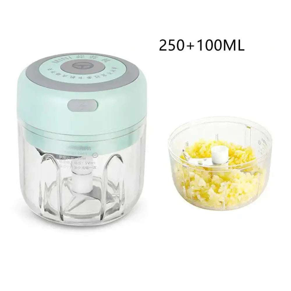 Usb electric mini food chopper and garlic mincer in mint green and gray with clear glass container and removable cutting bowl